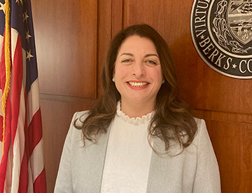 A photo of Commissioner Lucine Sihelnik smiling