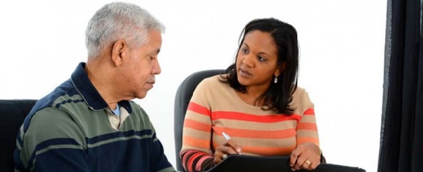 Photo of woman counseling man