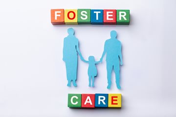 Image that shows a family and says Foster Care
