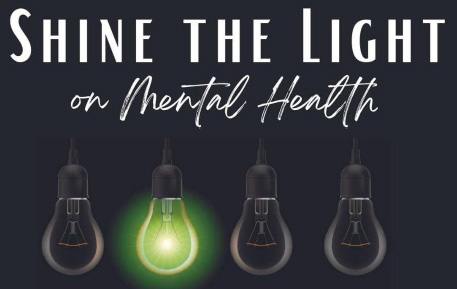 Shine the Light logo with green light bulbs